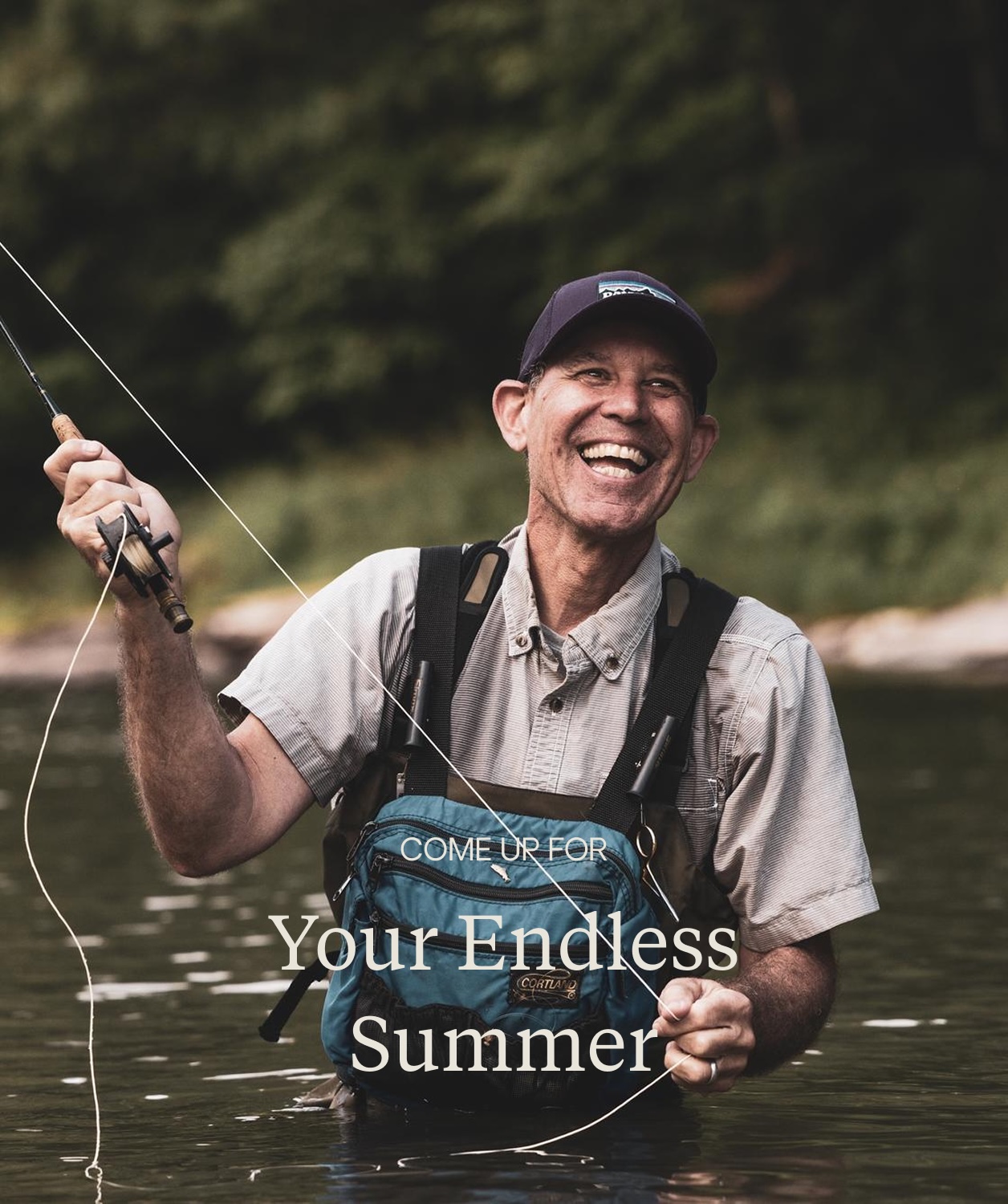 man smiling while casting a fly fishing line in mountain river man smiling while casting a fly fishing line in mountain river